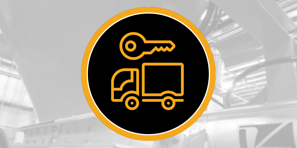 Black circular badge with yellow key above a box-truck icon, over a grayscale industrial shop, suggesting vacuum truck use